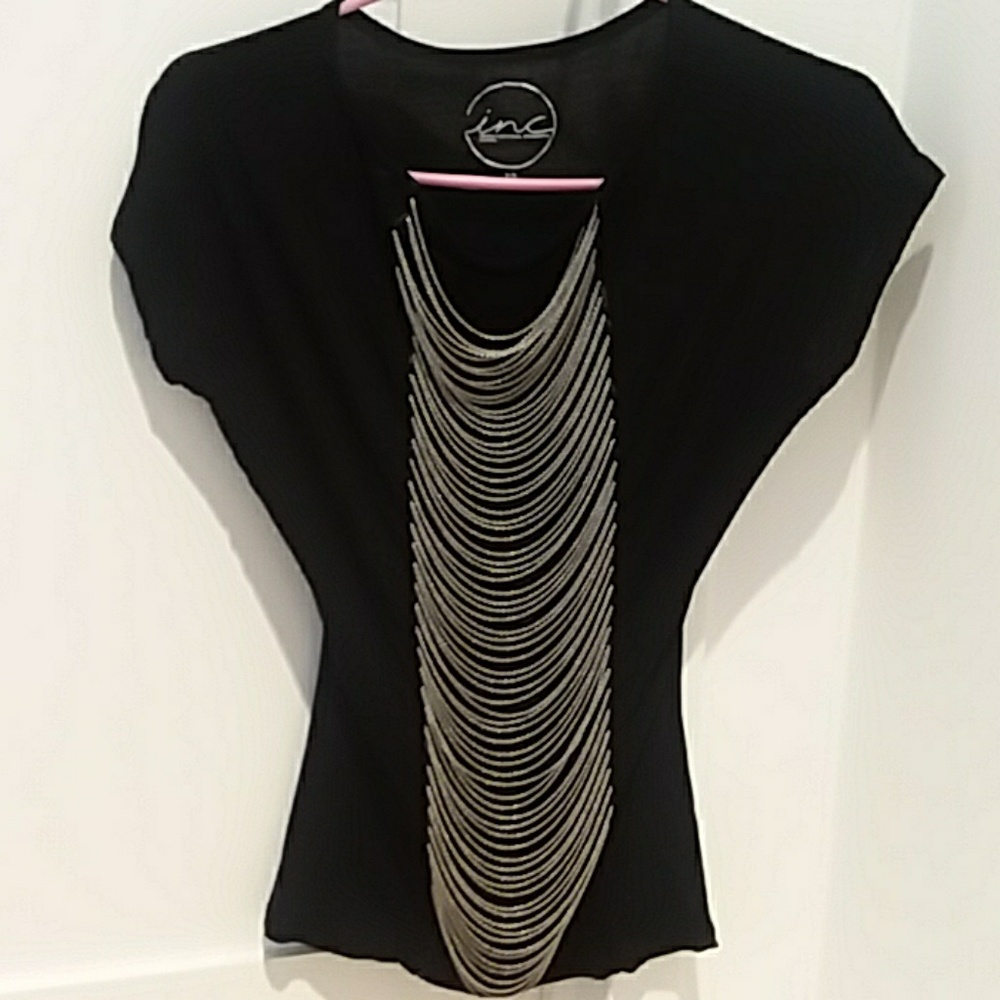 Inc tee shirt with chains on the front.Barely worn